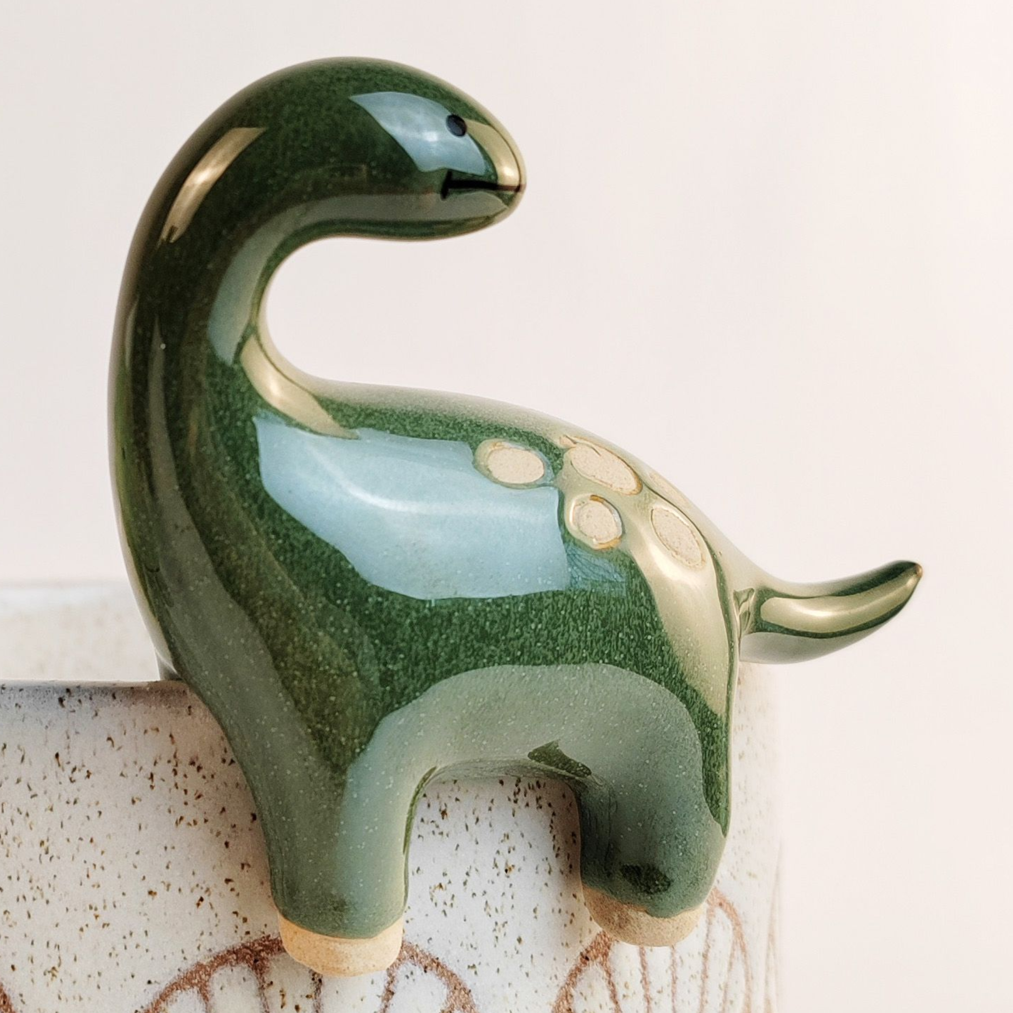 Dinosaur Pot Sitter Dark Green