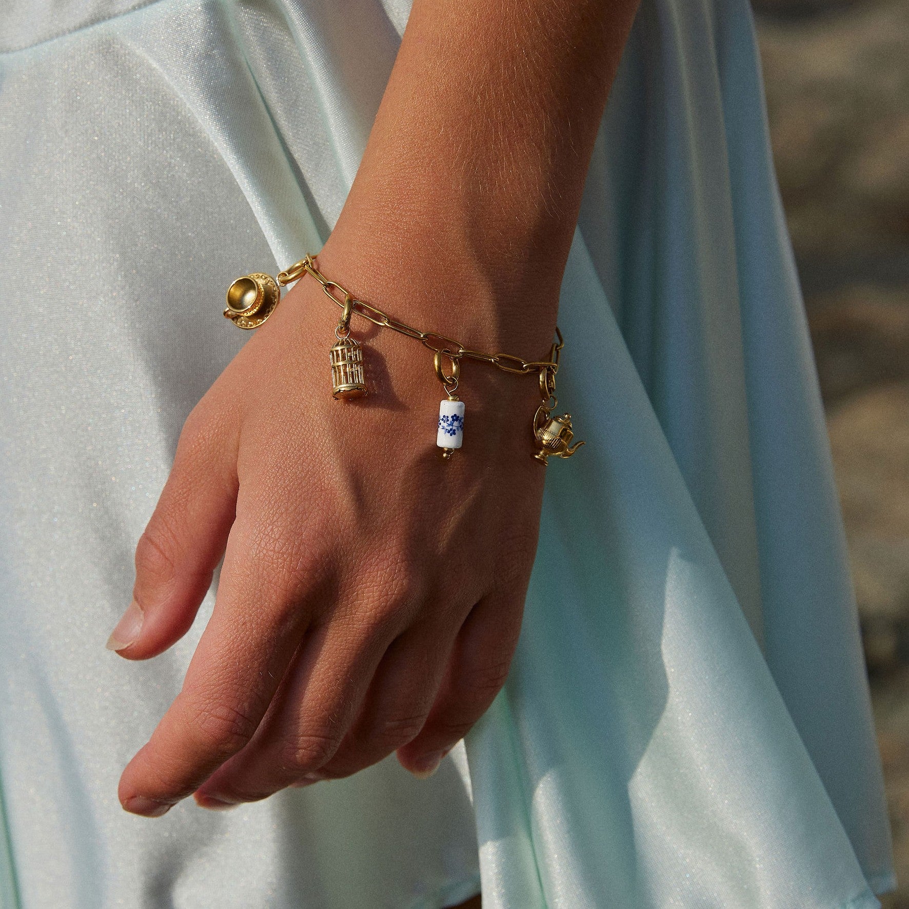 Gold-Charm-Bracelet_1.jpg