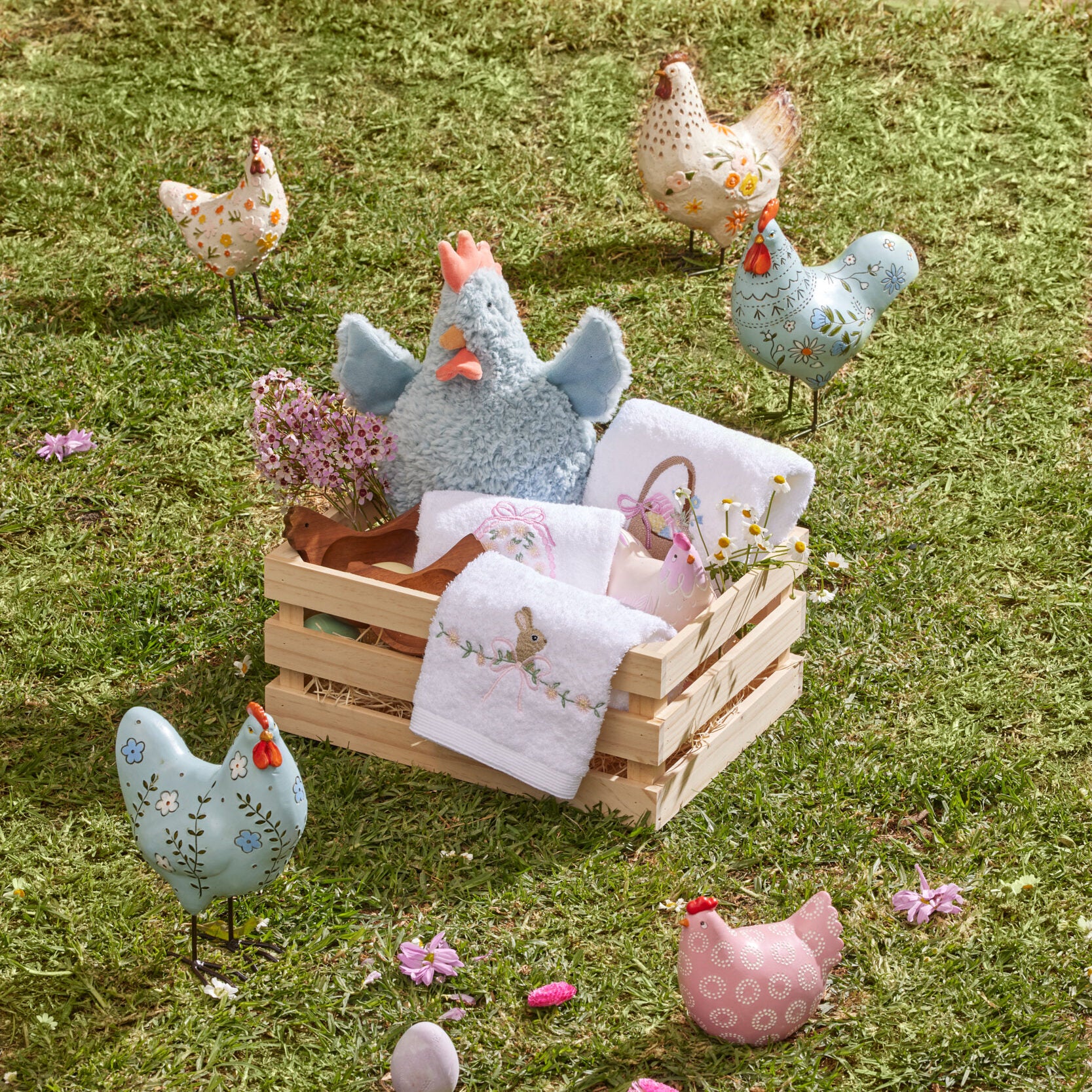 easter-meadow-chicken-sculptures-garden-display-pilbeam-living-e1762380924400.jpg