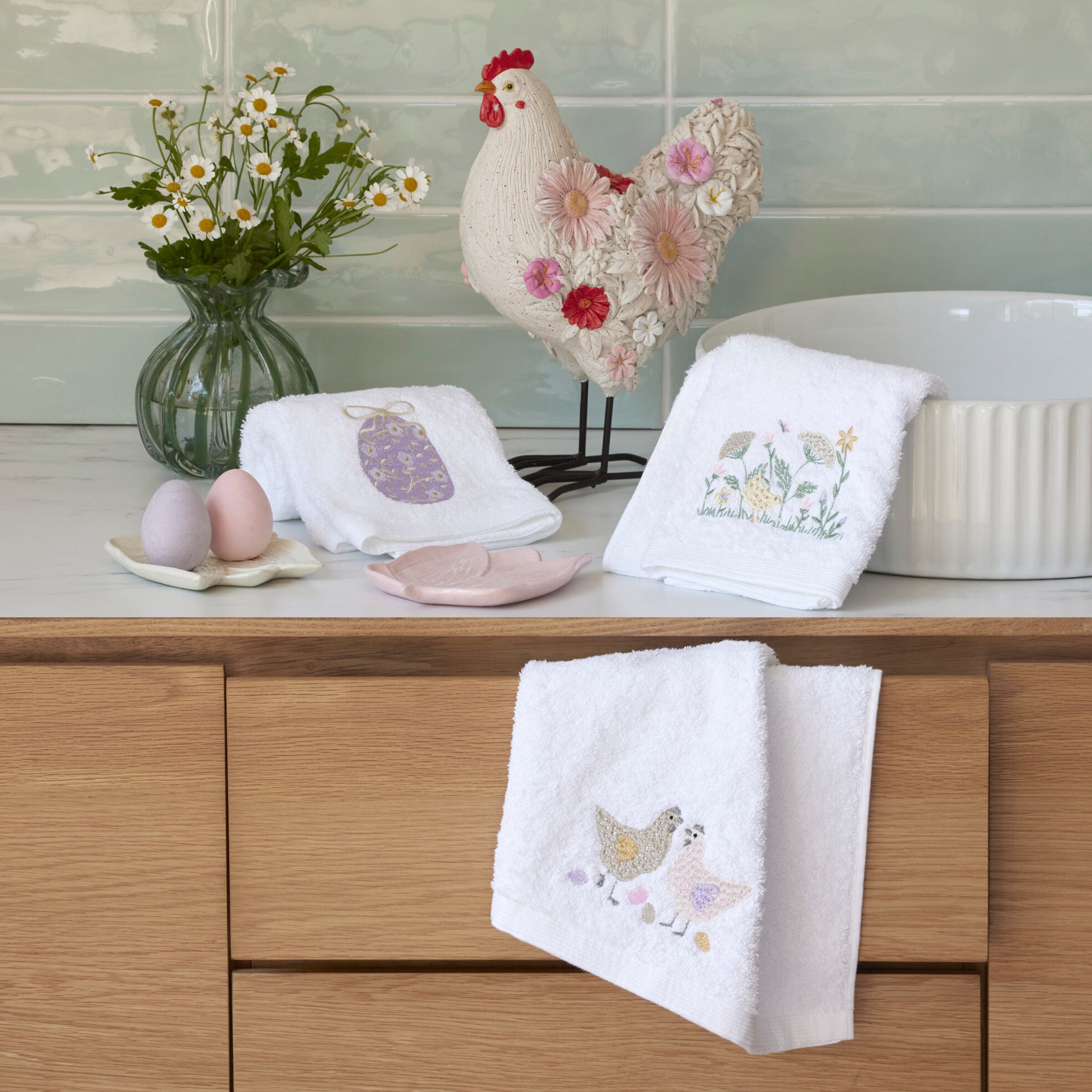 pilbeam-living-sonny-chicken-and-easter-meadow-embroidered-hand-towels-pastel-e1762386166712.jpg